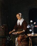 Gabriel Metsu Woman feeding a cat oil painting reproduction